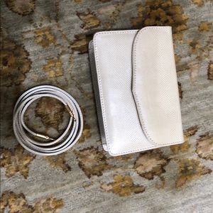 Genuine Karung clutch with shoulder strap